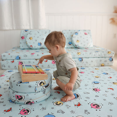 Toddler playing with Baby Shark™ x Roo & You™ Stepping Stones, soft foam balance toys for kids.