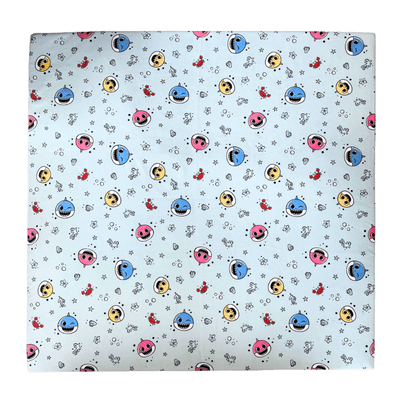 Flat lay of the Baby Shark™ x Roo & You™ Play Mat fabric with colorful characters.