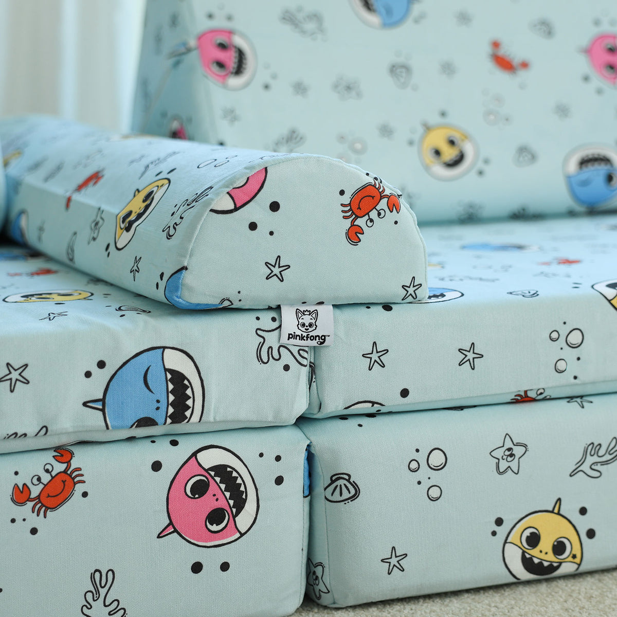 Close-up of Baby Shark™ x Roo & You™ Joey Play Couch Cover showing pattern details.