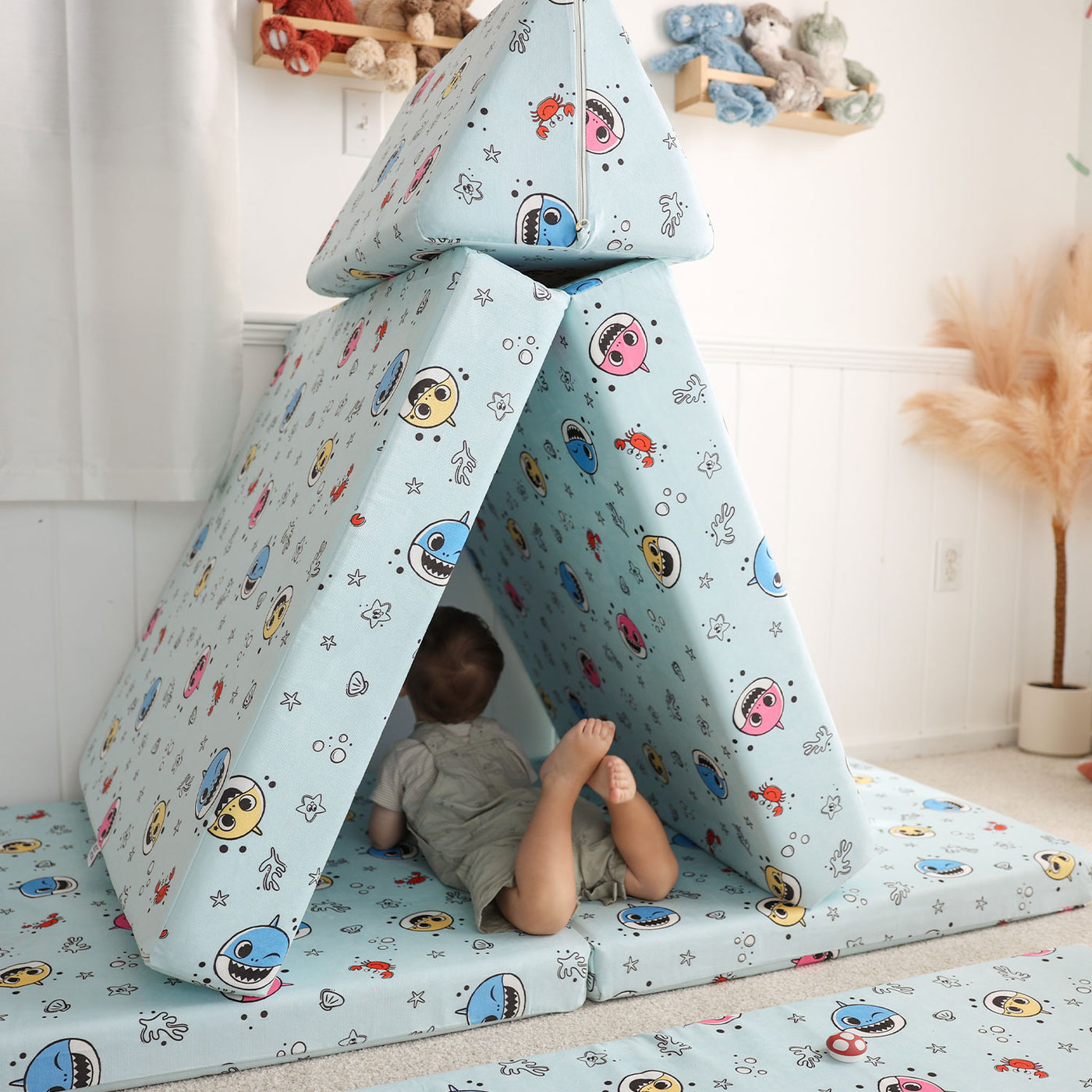 2
Toddler playing with Baby Shark™ x Roo & You™ Joey Play Couch covered in character print.