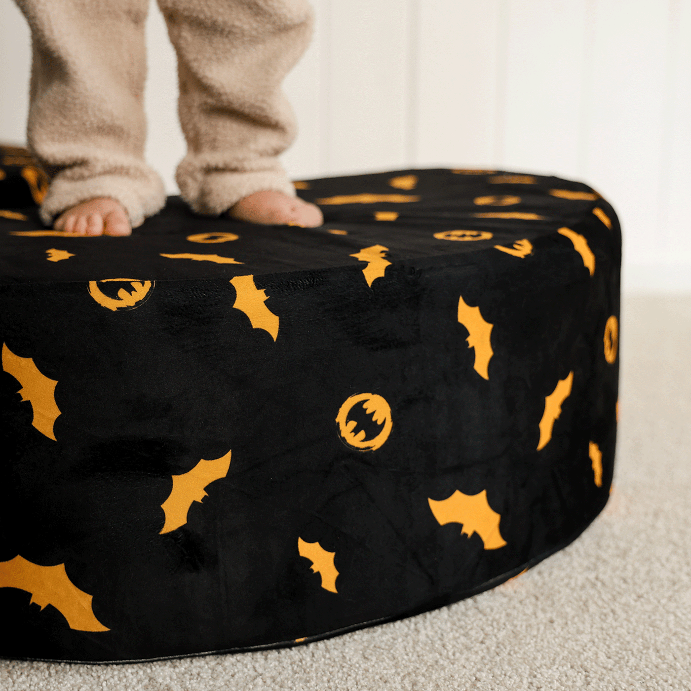 Child playing with Batman™ x Roo & You™ Rocker Set