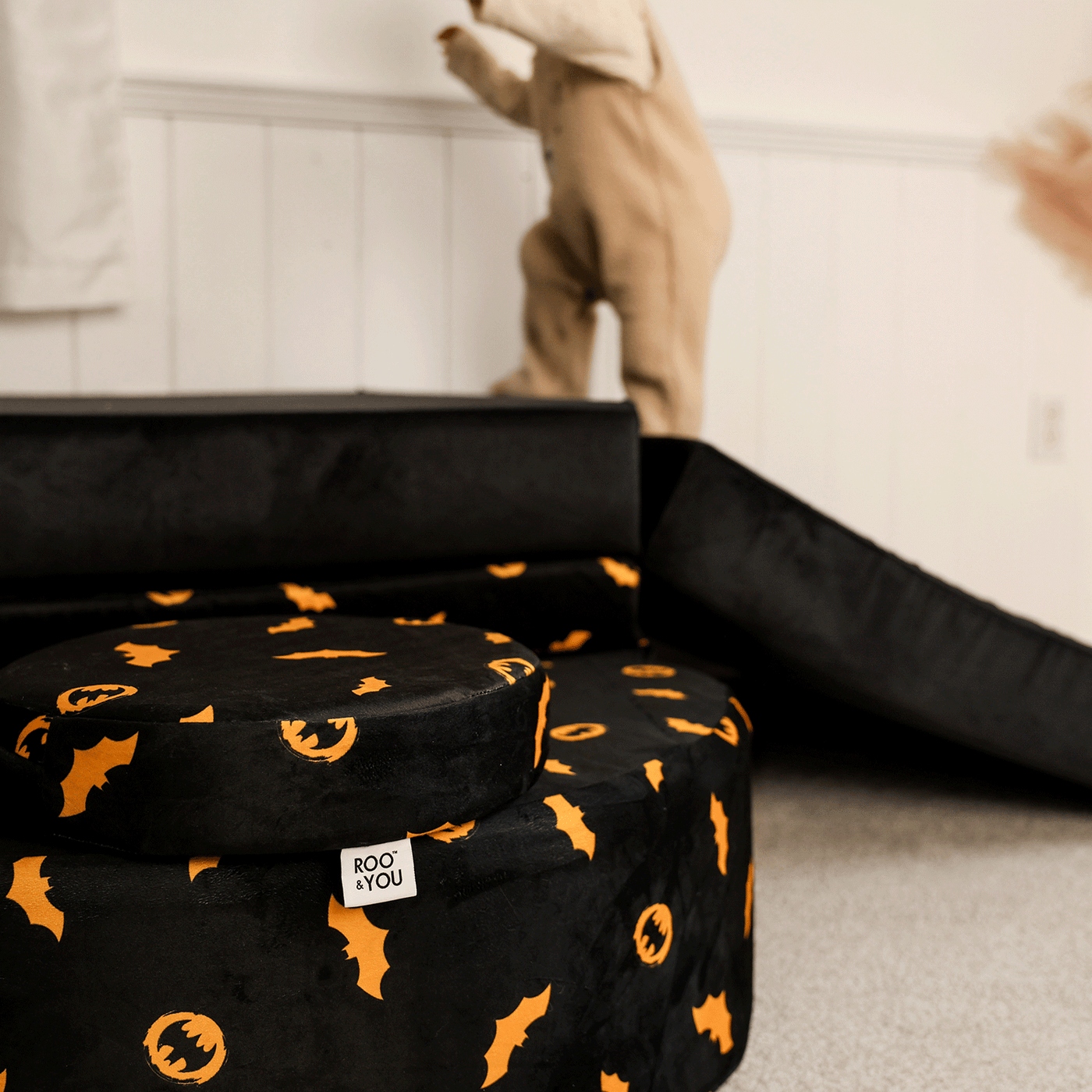 Child playing with Batman™ x Roo & You™ Rocker Set